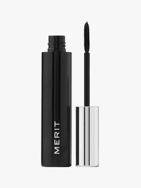 Merit Clean Volume Volumizing Tubing Mascara in branded component on a light gray background